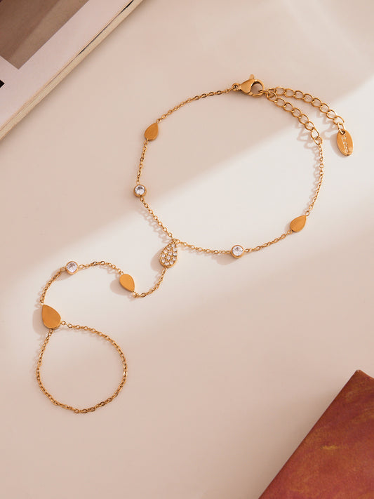Chaîne de main Emy dorée avec motifs ovales et cristaux - bijou bracelet bague délicat LUNARA